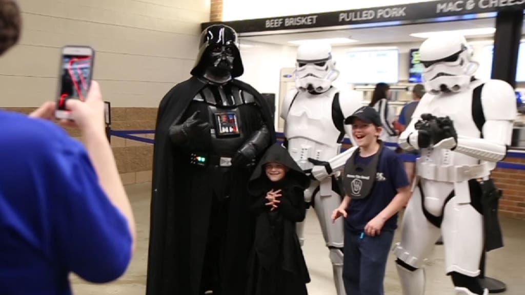 Darth Vader throws out the first pitch on Star Wars Night in Miami 