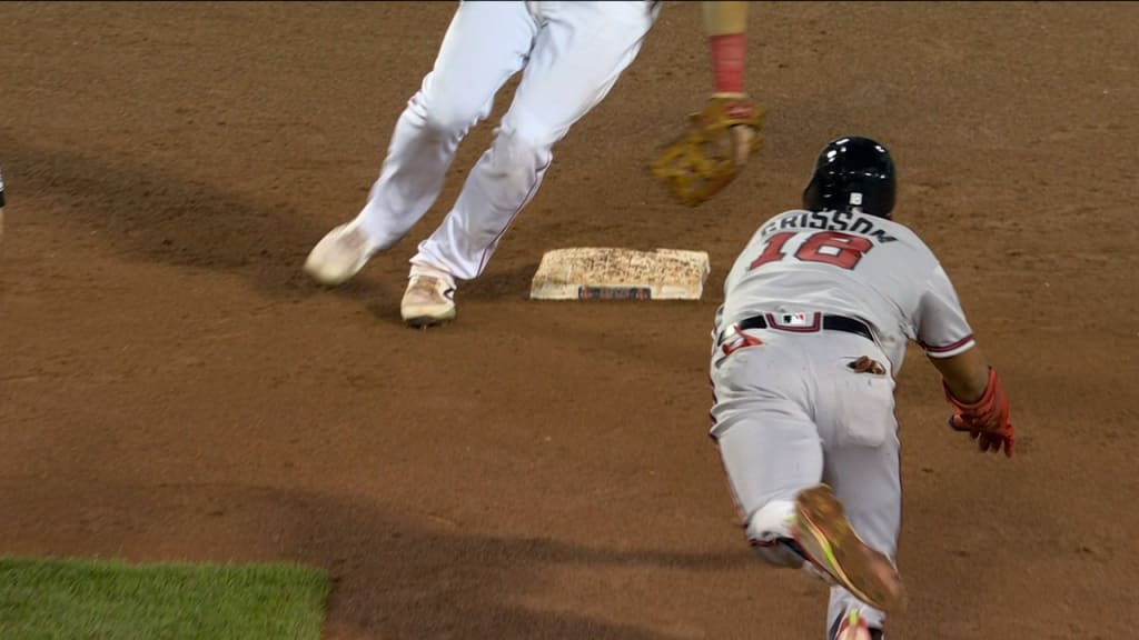 Atlanta Braves' Vaughn Grissom slides into second with a stolen