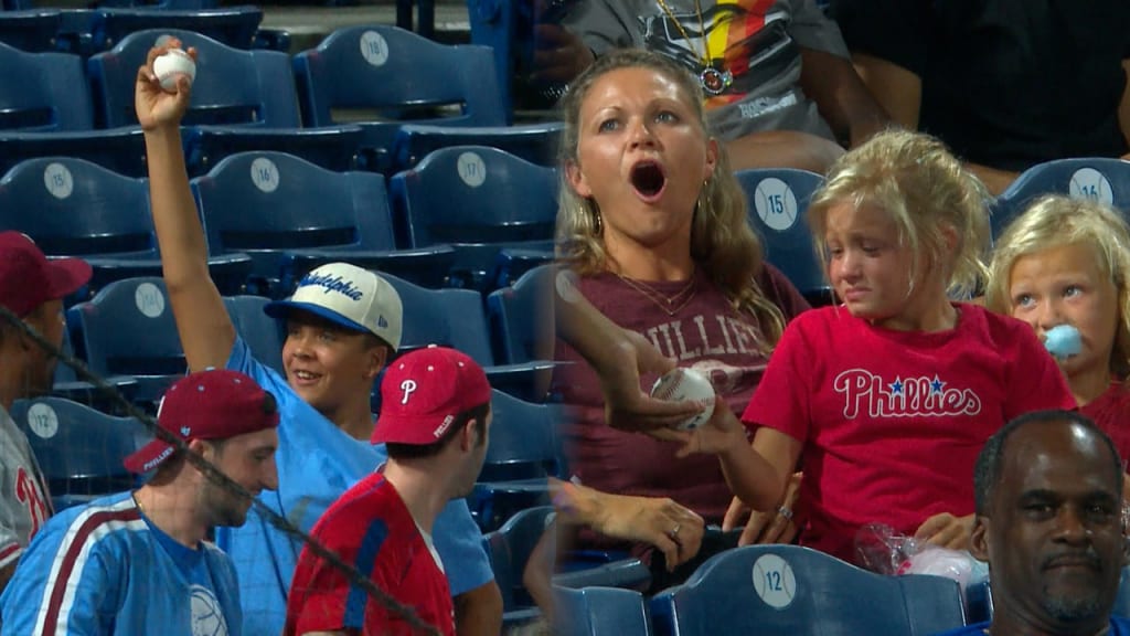 Baby Orioles fan couldn't decide if he wanted this foul ball or not