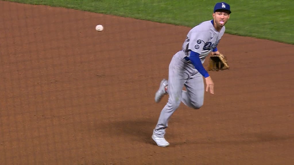 Infielder Trea Turner of the Los Angeles Dodgers throws a ball into