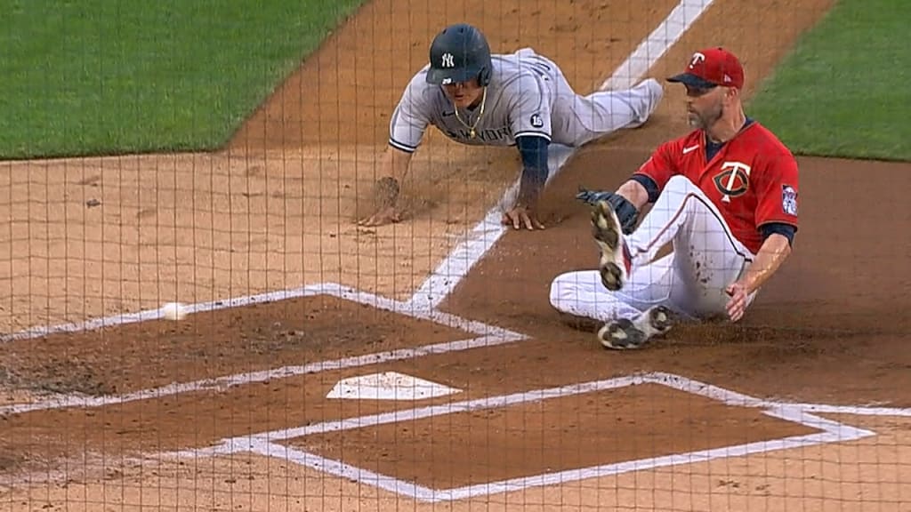 Twins get out at home plate