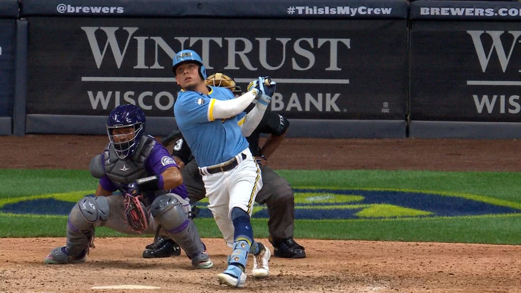 Milwaukee Brewers' Luis Urias watches his solo home run off Colorado  Rockies relief pitcher Jake Bird during the ninth inning of a baseball game  Wednesday, Sept. 7, 2022, in Denver. (AP Photo/David