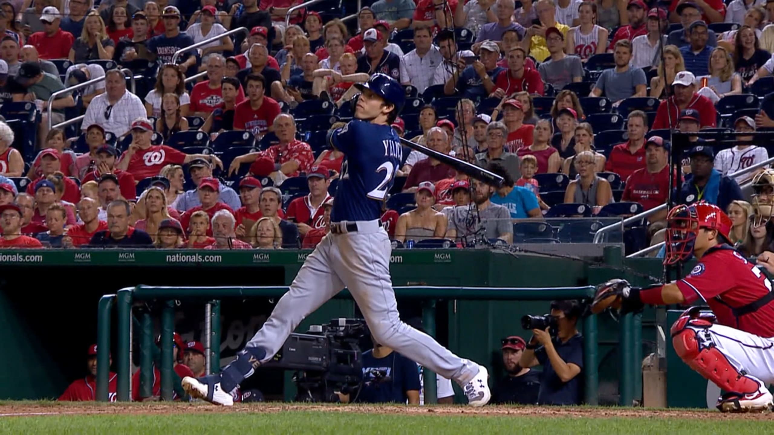 Images from the Brewers' 15-14 victory over the Nationals in 14 innings