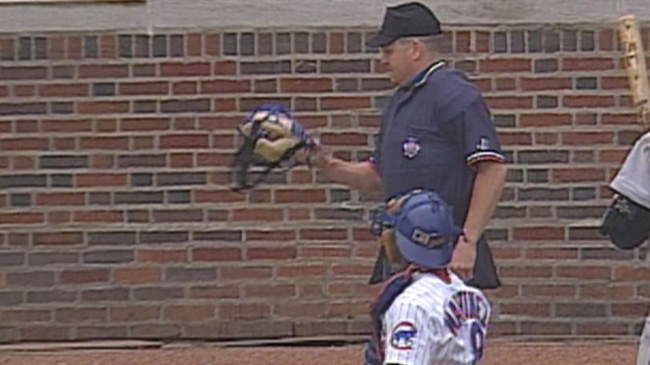 Wood's first pitch hits umpire