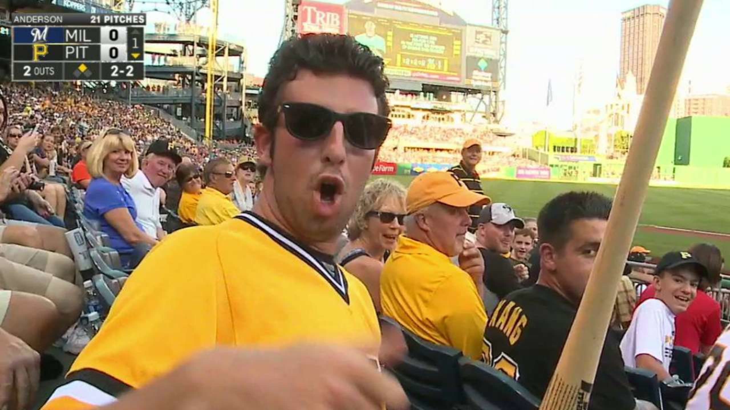 Bat goes flying, fan celebrates