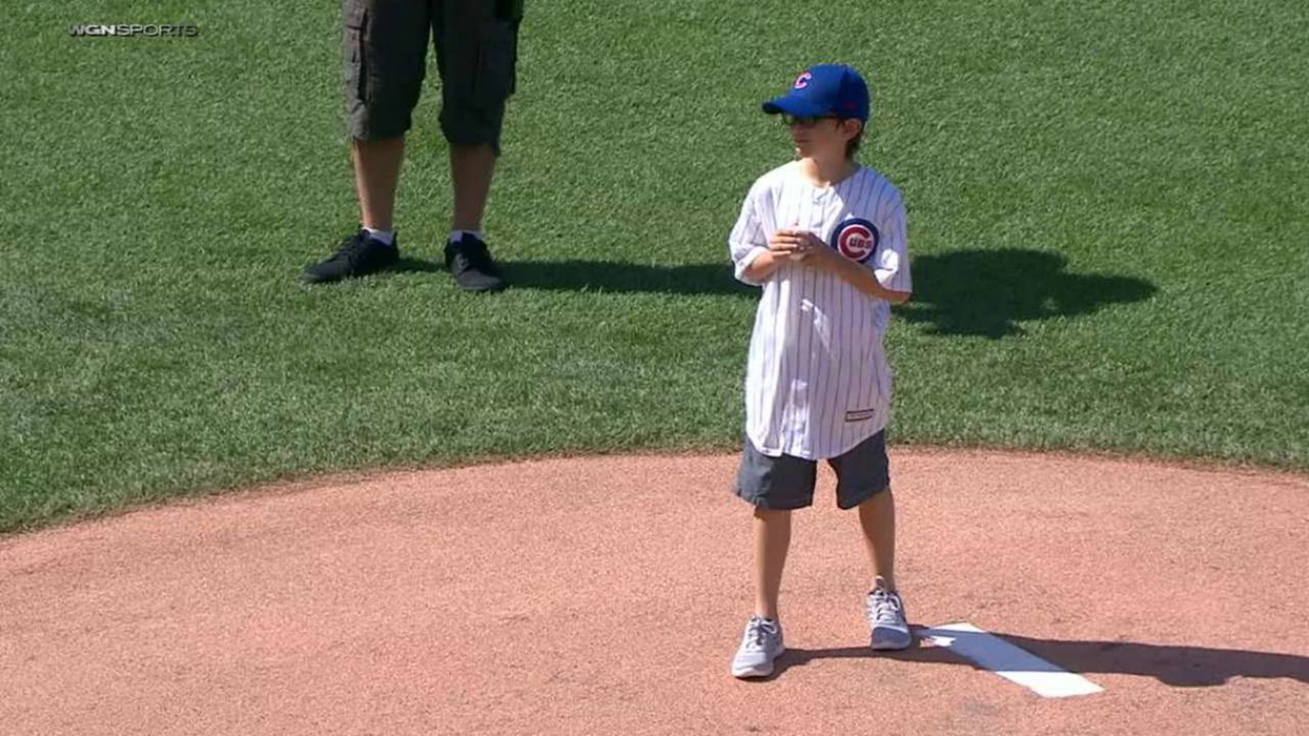 Soldier's son throws first pitch