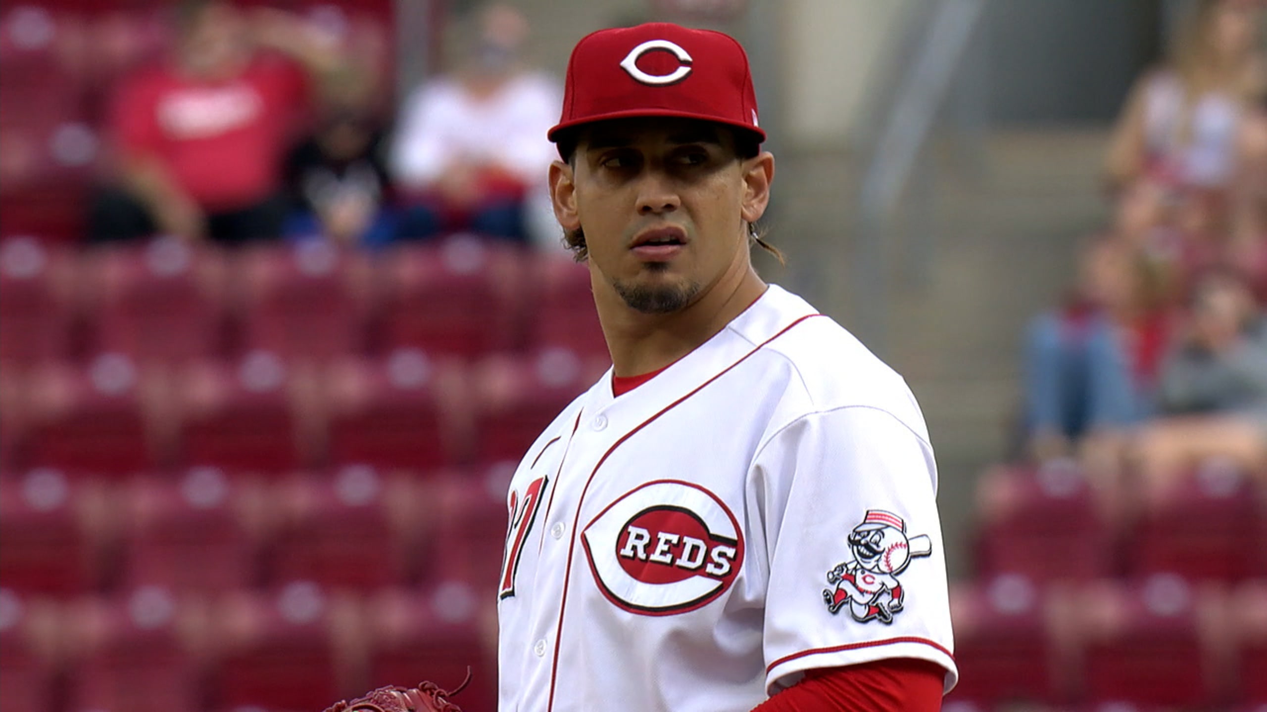 Joey Votto sports Barry Larkin jersey, poses with fans, sits in bleachers  during Reds game