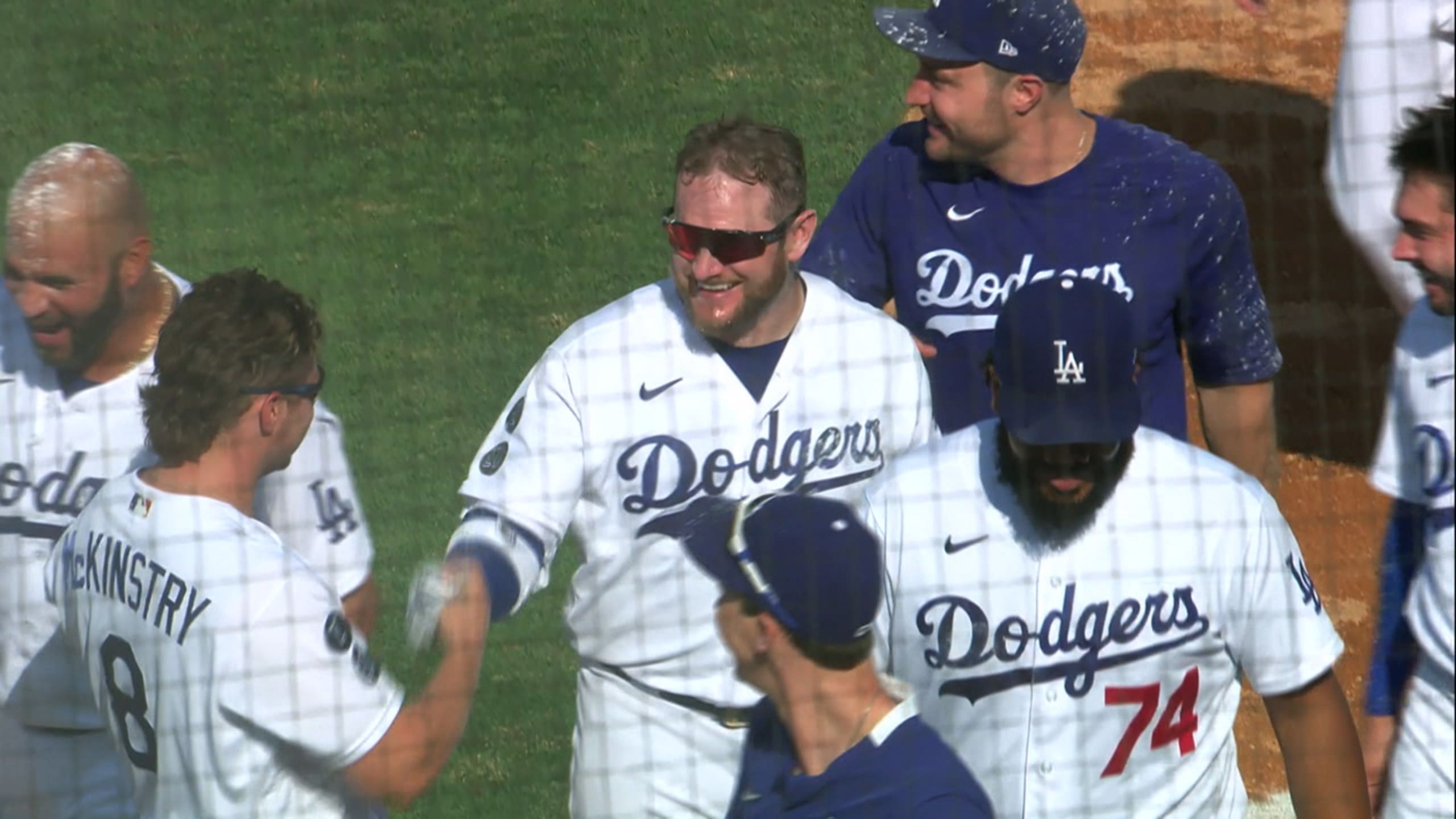 Injury-plagued Dodgers keeping close in bid to repeat title