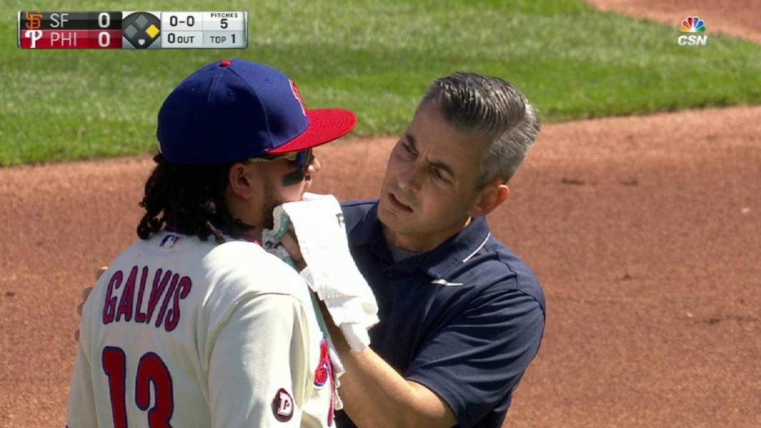 Galvis stays in despite bad hop