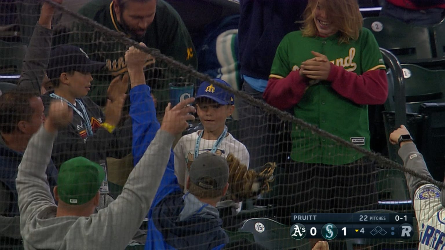 Teenage Red Sox fan gifts foul ball to the little boy sitting