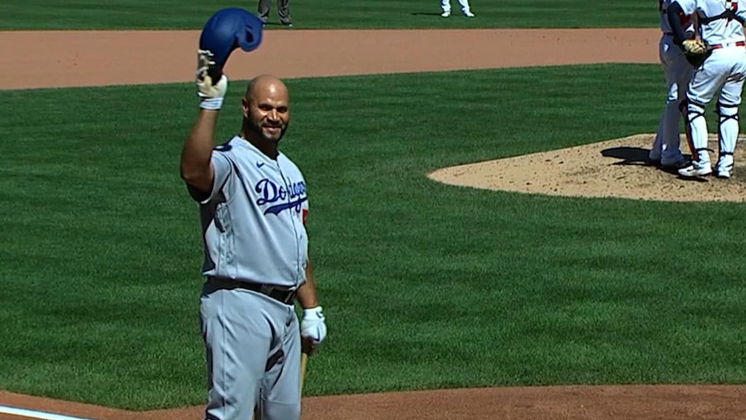 Pujols returns to Cardinals, gets standing ovation in Jupiter