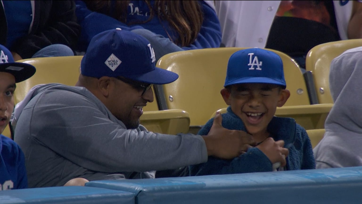 dodgers fan catches ball with kid｜TikTok Search