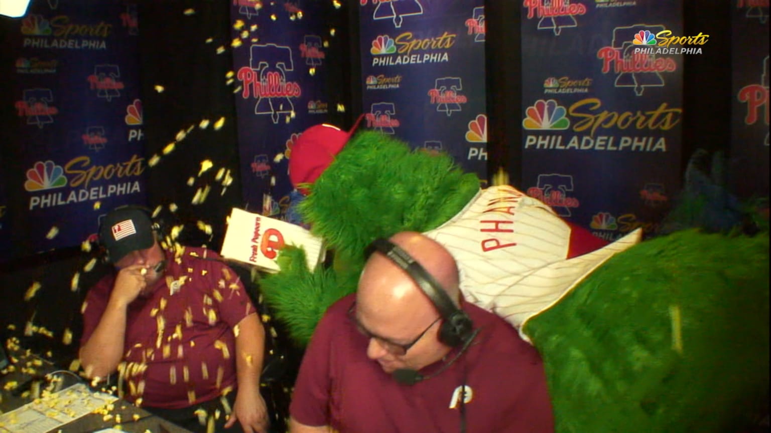 The Phillie Phanatic dressed John Kruk as a gladiator during a broadcast