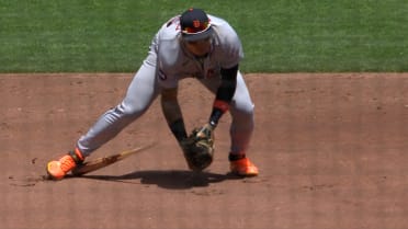Javier Báez can't avoid bat