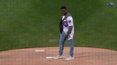 Hart tosses 1st pitch, sings