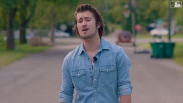 Schneider Sings National Anthem