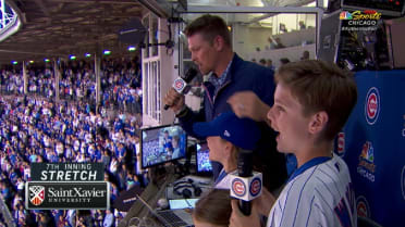 Wood joins the booth, sings