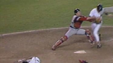 Fisk tags two at home plate