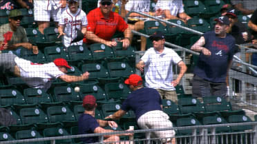 Fan takes a tumble on foul ball