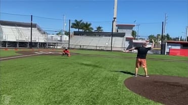 Boog Powell throws first pitch
