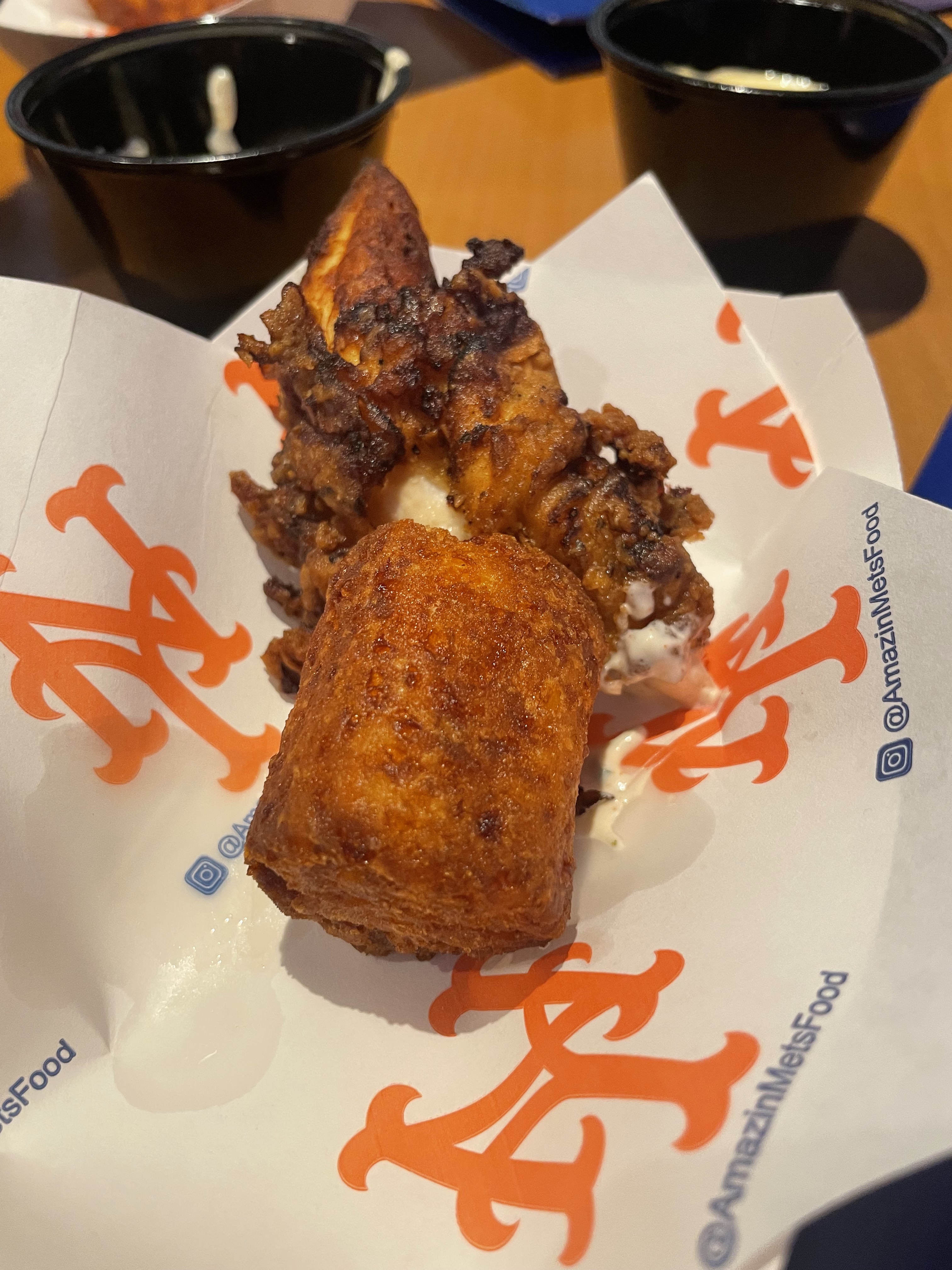 The chicken tenders and cheesy tater kegs from Amazin' Chicken Co. Notice that I forgot to get a photo before chowing down, so tried to cover it up. Whoops.