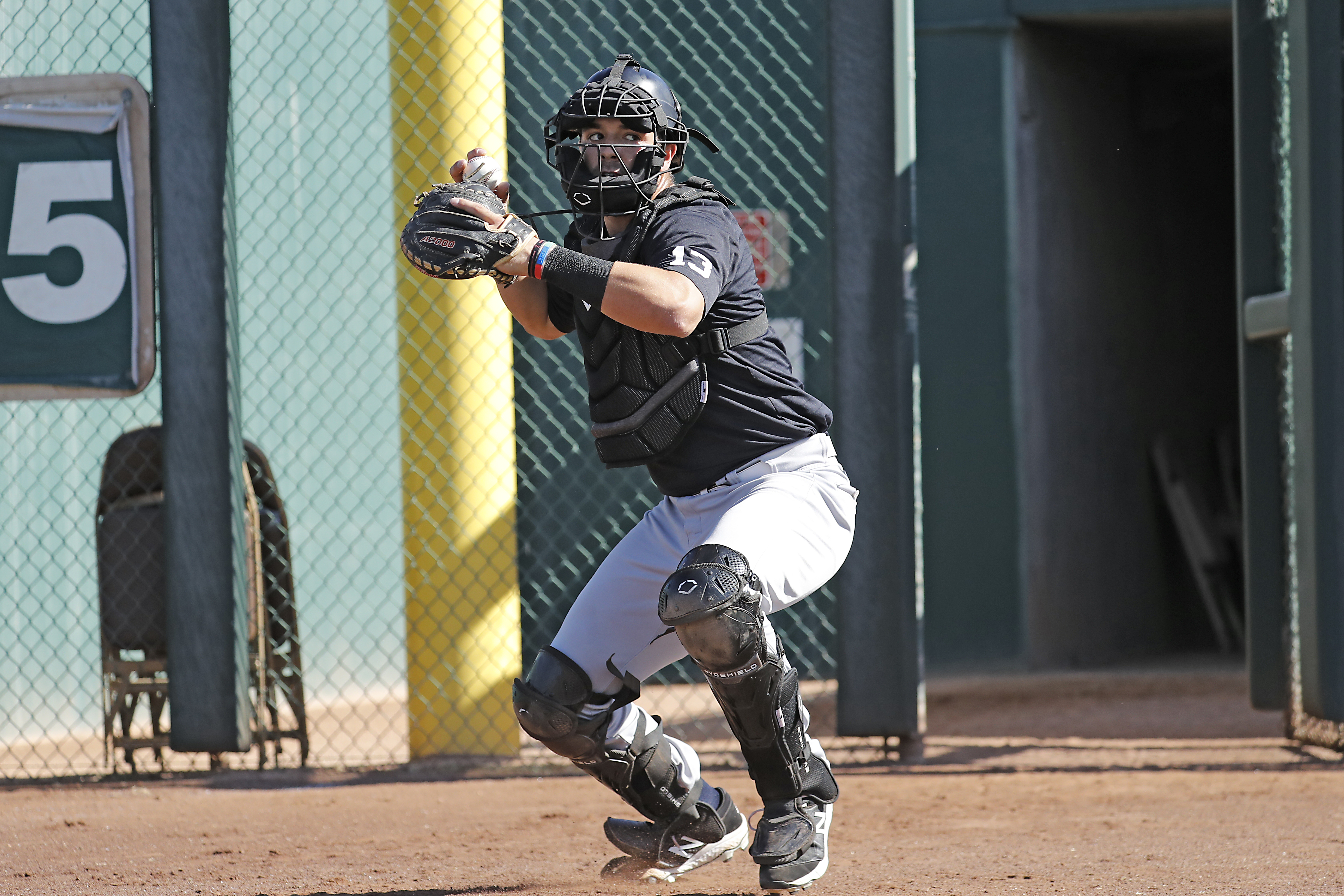 In his work behind the plate, Austin Wells always tries to find a new edge to help fuel his progression. Coaches have marveled at the way the 22-year-old absorbs information, and the sophistication in his understanding of the role’s many challenges. “It’s the most competitive position on the field,” Wells says. “No breaks. That’s OK.” (Photo Credit: New York Yankees)