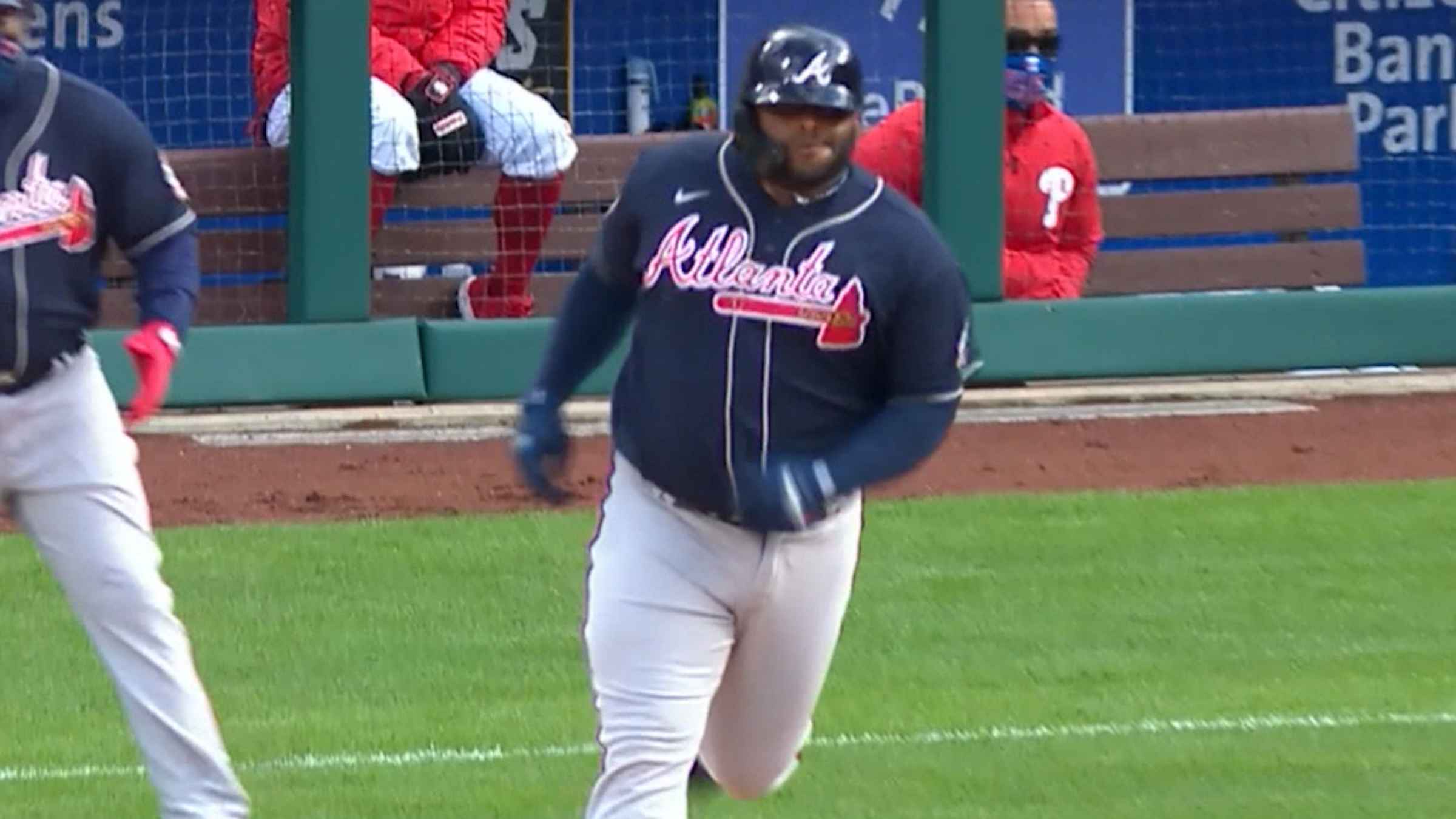 May 08, 2021: Atlanta Braves infielder Pablo Sandoval celebrates as he runs  down the first baseline after hitting a game tying home run during the  ninth inning of a MLB game against