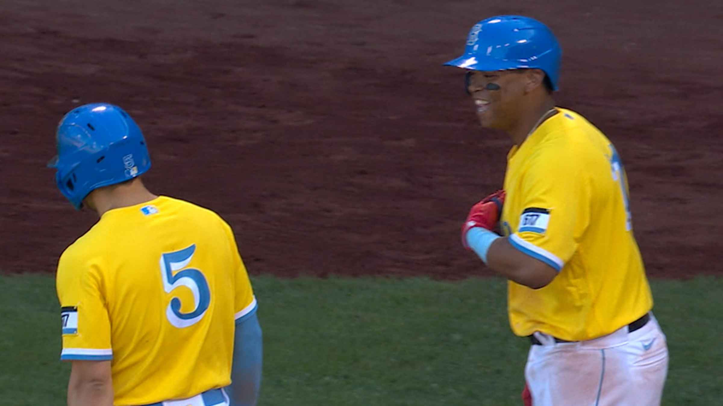 Boston Red Sox wearing yellow and blue uniforms for all three