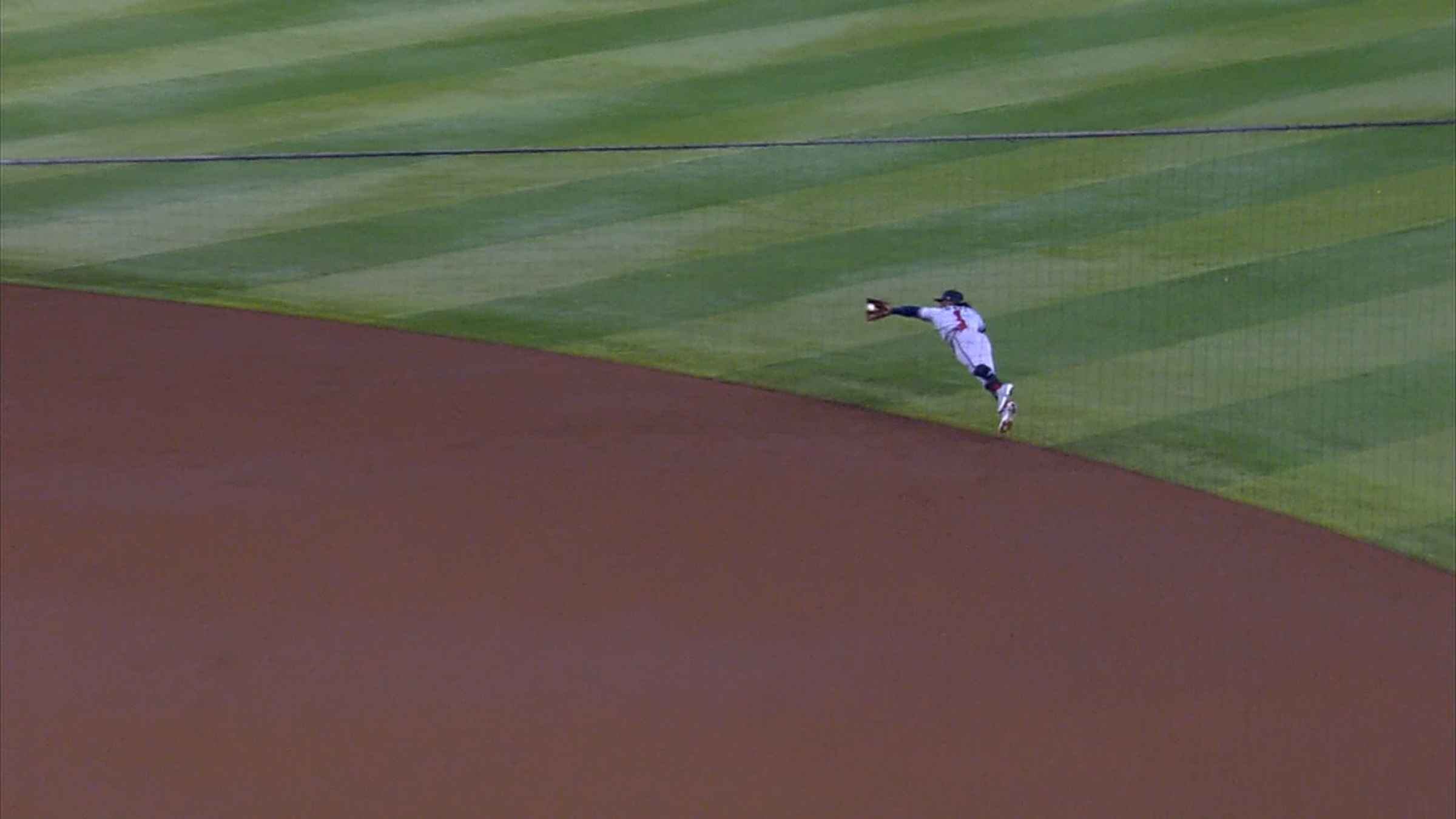 Ozzie makes an incredible diving stop, throw 