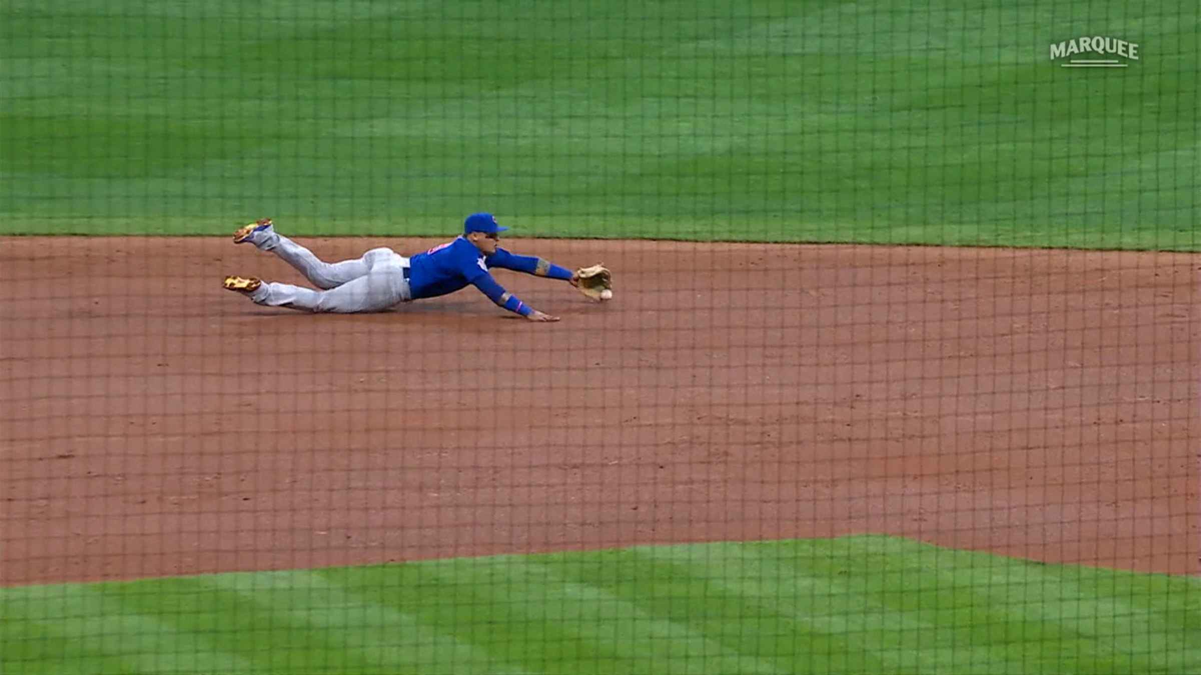 WATCH: Javier Baez goes airborne on diving stop, pulls off spectacular  defensive play