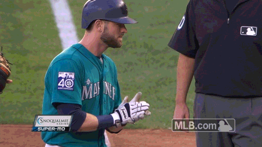 Mitch Haniger hit a walk-off homer before the Safeco Field roof could close and stop the rain ...