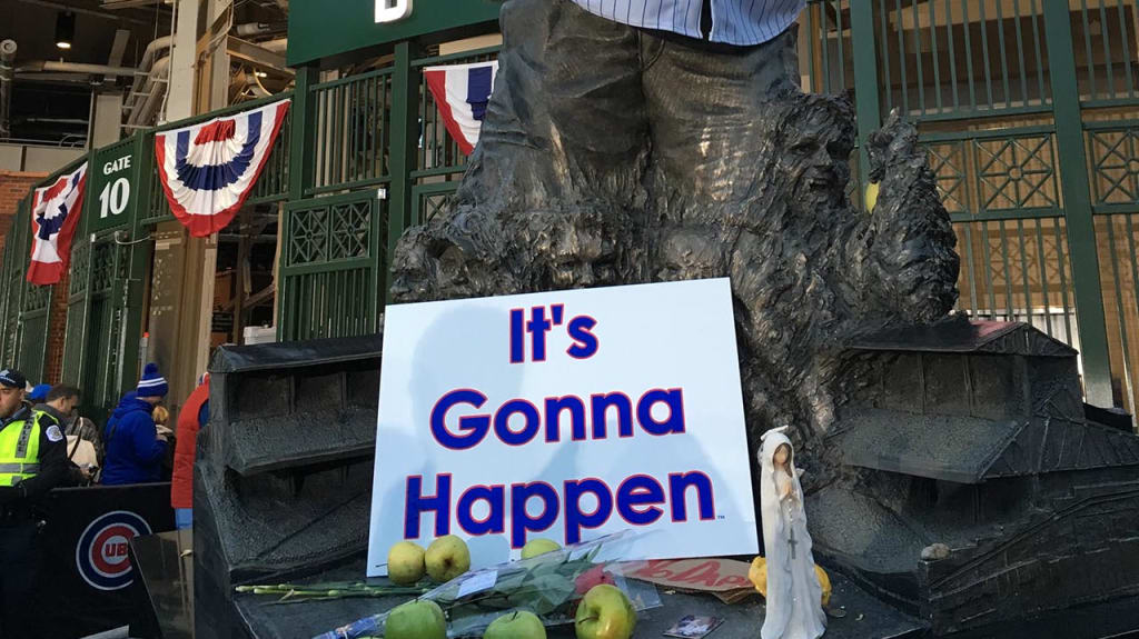 Cubs fans tried to help their team rally by putting green apples on  Wrigley's Harry Caray statue