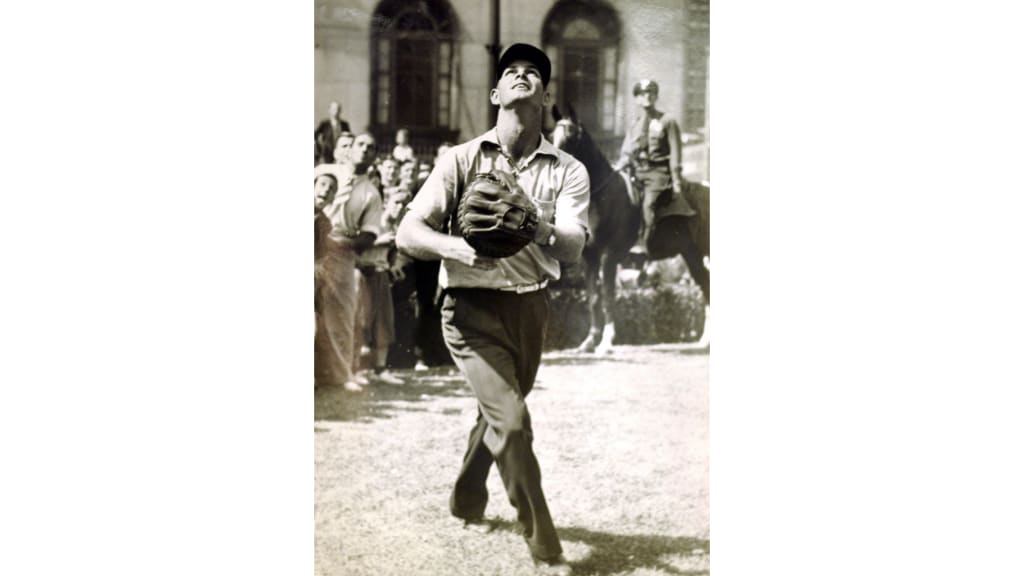 Hank Helf waits for a ball at the base of Cleveland Terminal Tower, 1938.