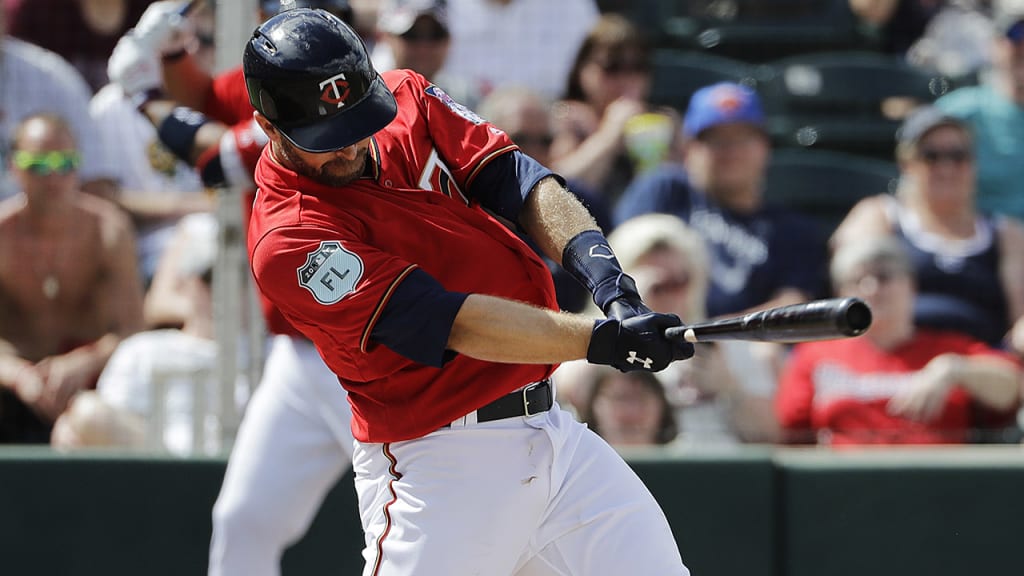 Brian Dozier's three-run homer was his first of the spring and it helped back Phil Hughes' impressive outing. (AP)