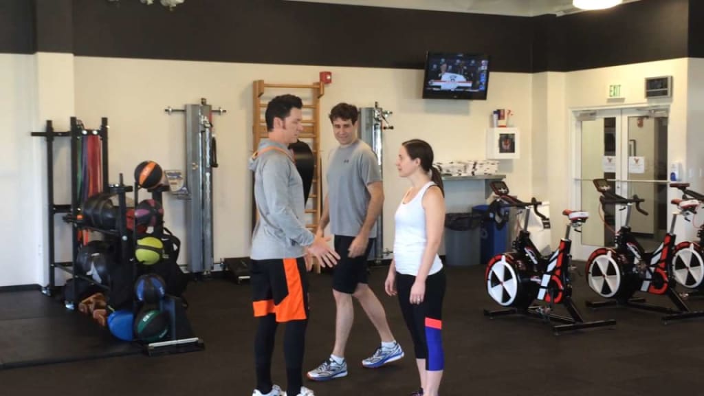 Orioles Brady Anderson works out with fans