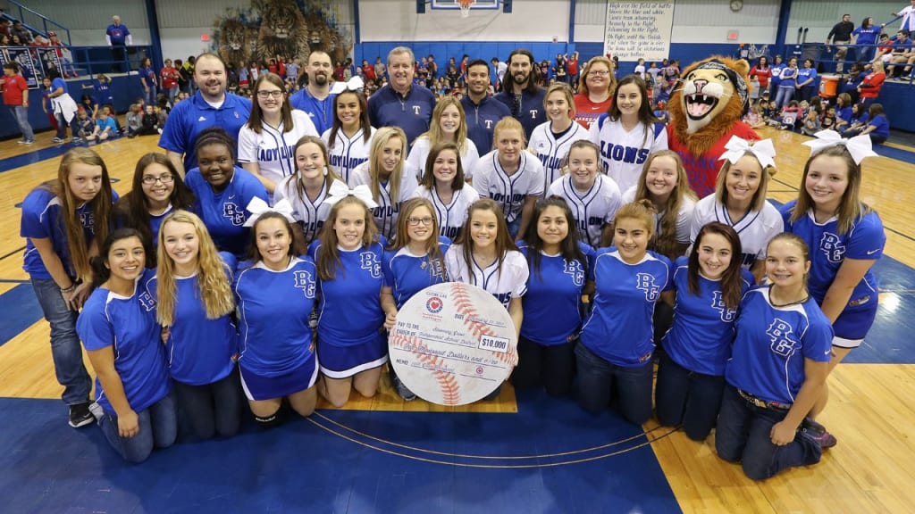 The Rangers donate $10,000 to the Nacogdoches Youth Softball Association. (Courtesy Texas Rangers)