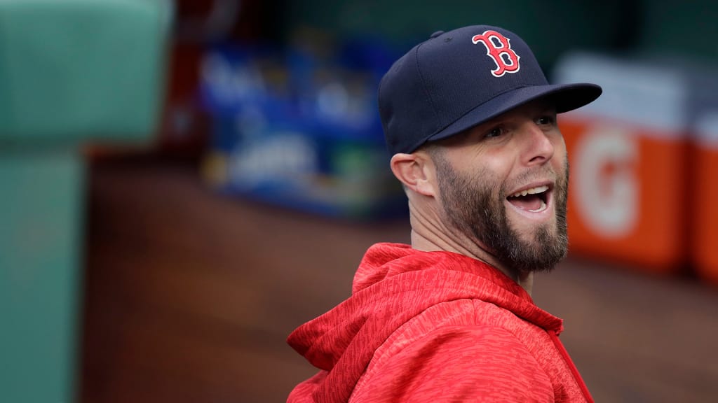 Boston Red Sox second baseman Dustin Pedroia in the dugout prior to a baseball game at Fenway Park in Boston, Friday, April 13, 2018. (AP Photo/Charles Krupa)