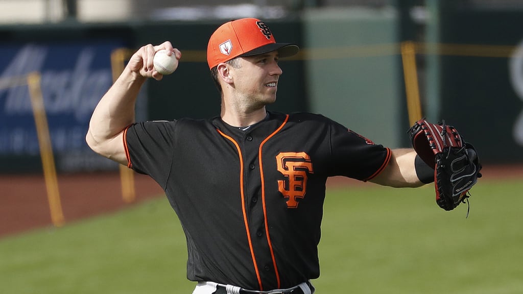 San Francisco Giants' Buster Posey works out during a spring training baseball practice, Friday, Feb. 15, 2019, in Scottsdale, Ariz. (AP Photo/Matt York)