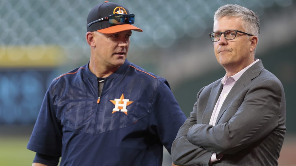 HOUSTON, TX - APRIL 04: Manager A.J. Hinch #14 of the Houston Astros and general manager Jeff Luhnow talk during batting practice at Minute Maid Park on April 4, 2017 in Houston, Texas. (Photo by Bob Levey/Getty Images)