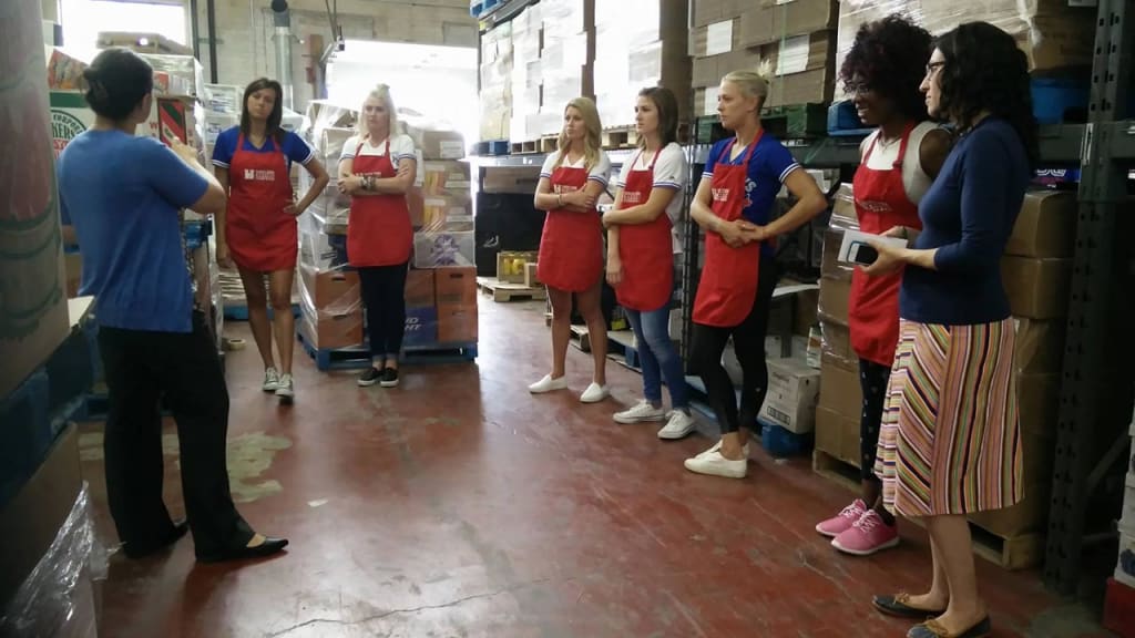 The Lady Jays volunteered and took a tour of the North York Harvest Food Bank in preparation for their upcoming annual food drive.