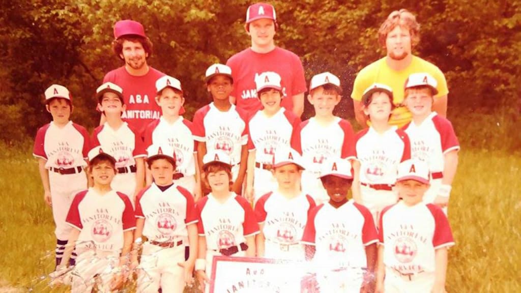 Duke Hail (yellow shirt) coached Ken Griffey Jr. (back row, fourth from left) and his brother, Craig (bottom row, second from right). (Hail family collection)