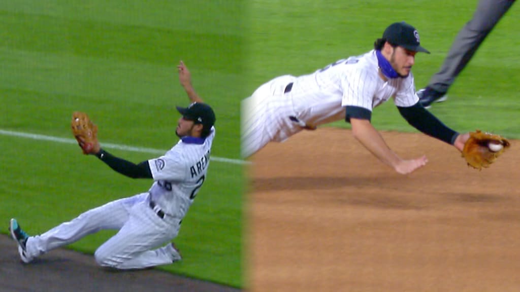 Colorado Rockies' Matt Kemp heads to home plate to score on a