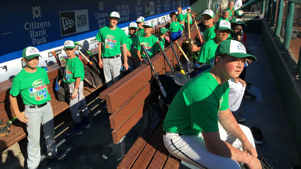 Kids sit in the dugout during Scotts Pitch, Hit & Run activities on Saturday morning at Citizens Bank Park. (Evan Webeck)