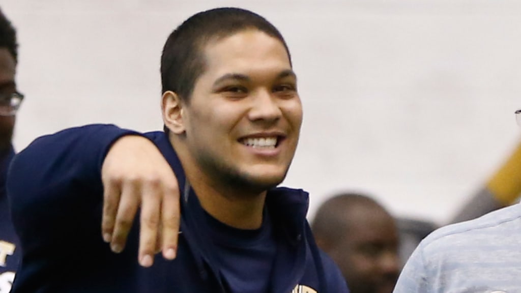 "I'm honored and thrilled to throw out the first pitch for the Pirates' season opener," said James Conner. (AP)
