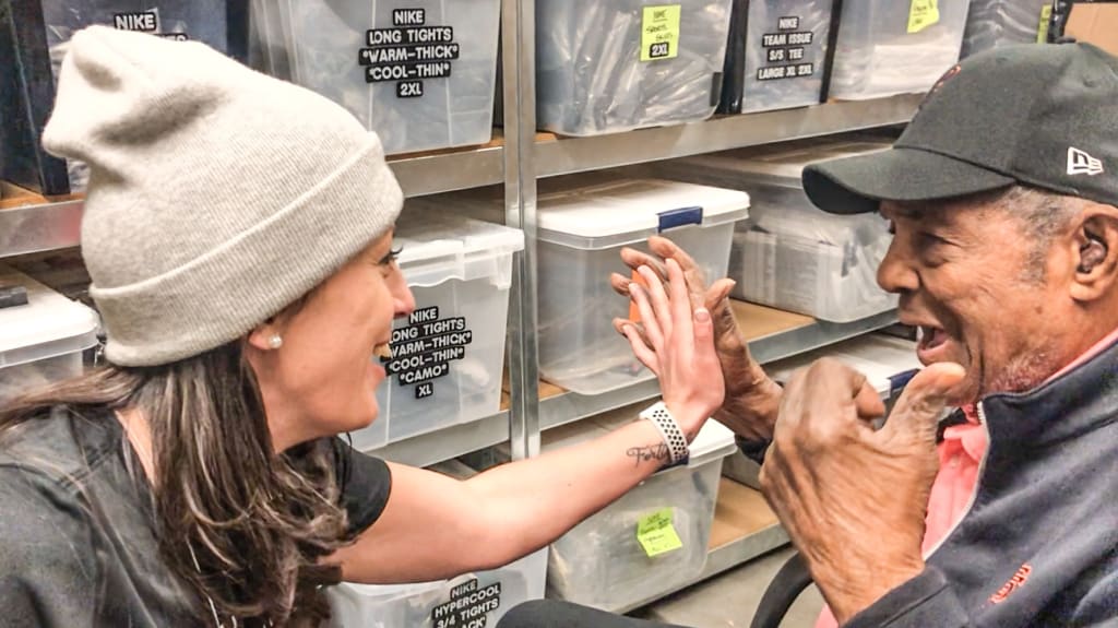 Taylor comparing her hands to Willie Mays' "meat mitts."