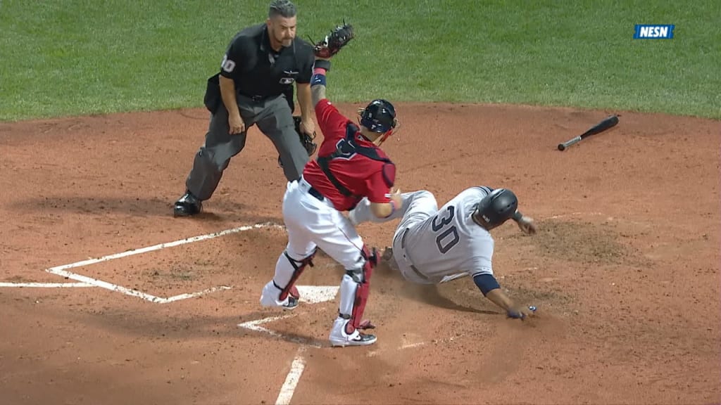 Devers throws out Encarnacion