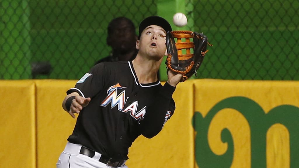 Miami Marlins right fielder Brian Anderson catches a ball hit by Atlanta Braves' Brandon McCarthy during the fourth inning of a baseball game, Friday, May 11, 2018, in Miami. (AP Photo/Wilfredo Lee)