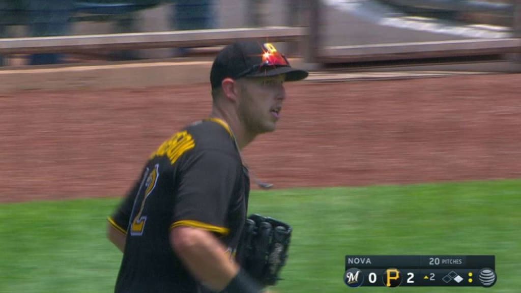 Pittsburgh Pirates left fielder Corey Dickerson, right, holds his