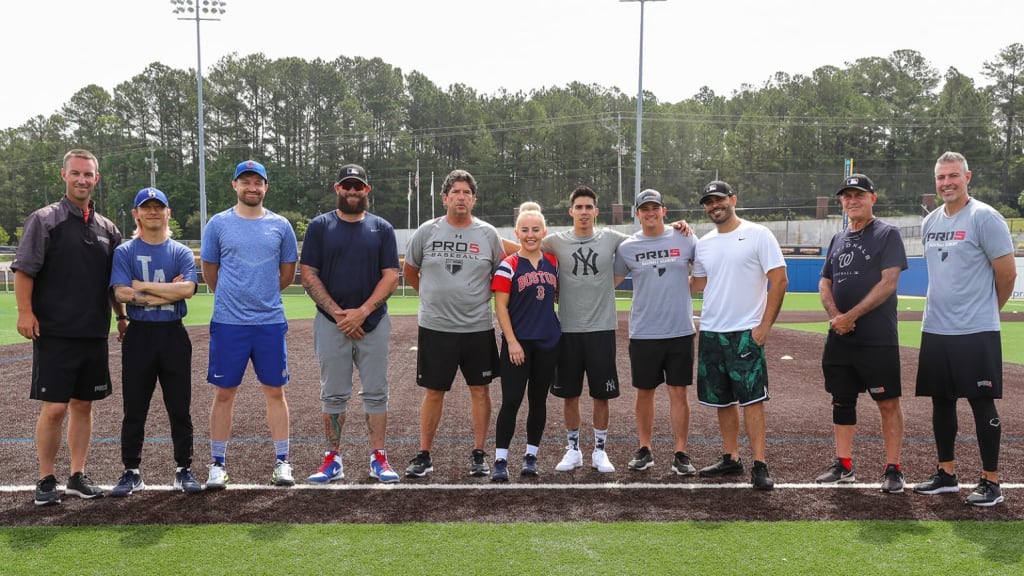 Coaches and players lineup for a photo during training in Raleigh, N.C.