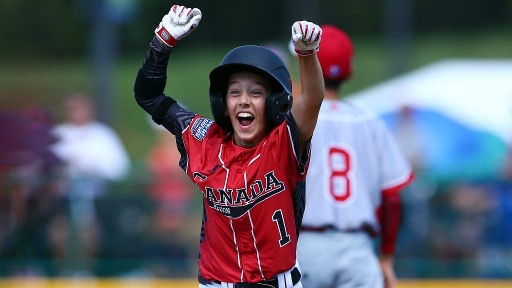 Canda's Matteo Ripoli celebrates after scoring a run during a game against Japan on Day 2 of the Little League World Series. (Alex Trautwig/MLB Photos)